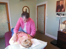 Judith Lewis Working with Patient - Medical Treatment